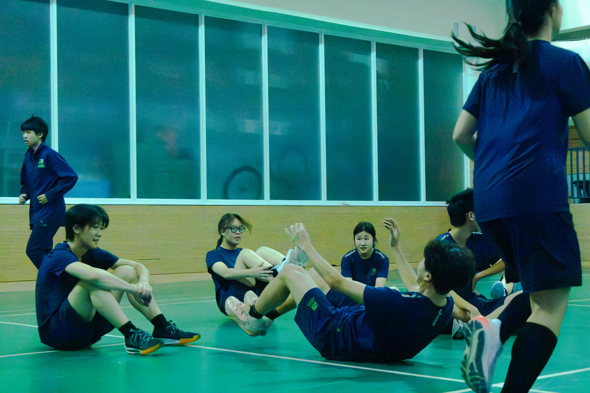 Coach demonstrating sports rehab drills